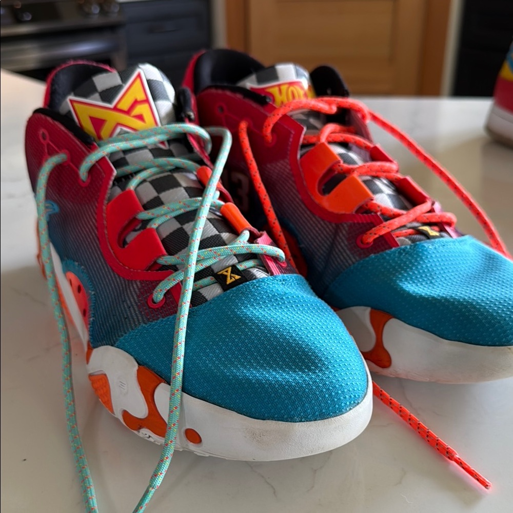 Nike Blue and Red Athletic Shoes with Dynamic Design